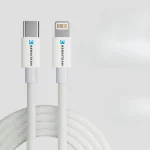 White braided charging cable with USB-C and Lightning connectors coiled side by side.